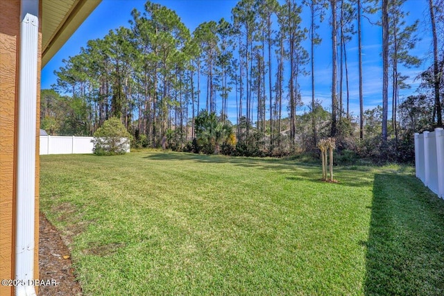 view of yard featuring fence