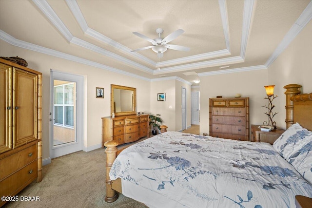 bedroom with crown molding, a raised ceiling, a ceiling fan, light carpet, and baseboards