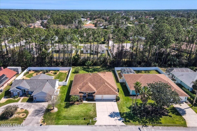 birds eye view of property with a residential view