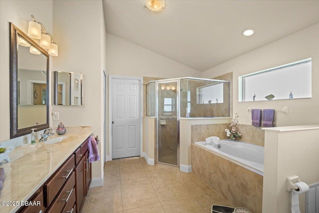 full bathroom with tile patterned flooring, a garden tub, vanity, and a shower stall