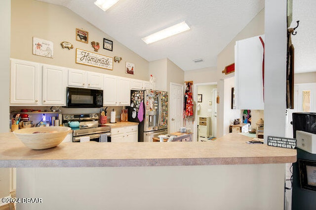 kitchen with white cabinetry, appliances with stainless steel finishes, a textured ceiling, kitchen peninsula, and lofted ceiling