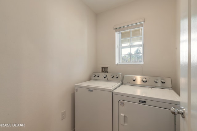 washroom featuring independent washer and dryer