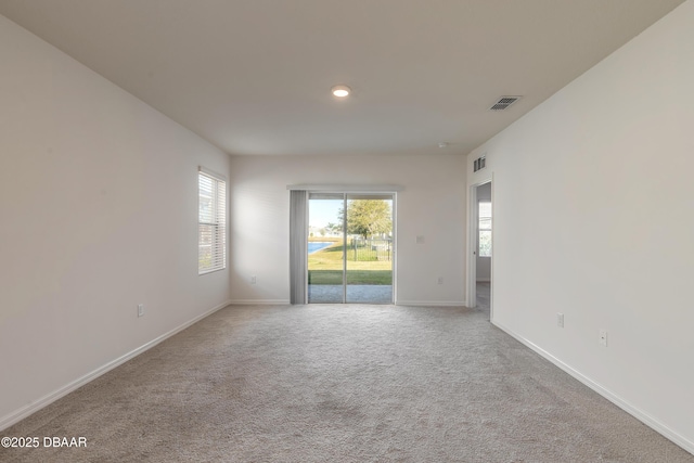 view of carpeted spare room