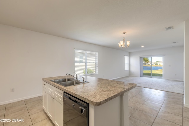 kitchen with sink, decorative light fixtures, white cabinetry, dishwasher, and an island with sink