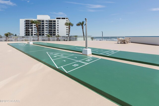 2625 S Atlantic Ave Unit 8Ne, Daytona Beach, FL 32118 - view of home's community featuring shuffleboard and fence