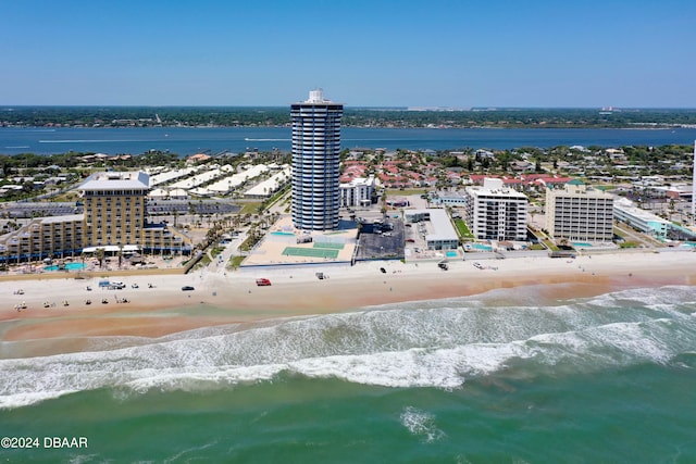 drone / aerial view with a view of the beach and a water view