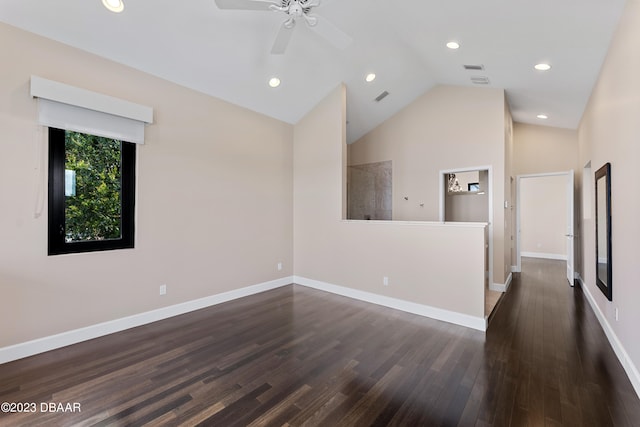 unfurnished room with dark wood-type flooring, ceiling fan, and high vaulted ceiling