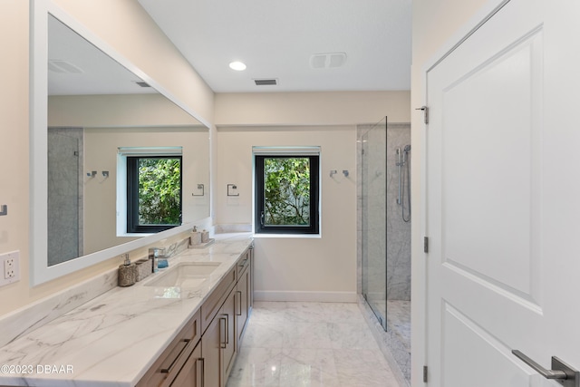 200 John Anderson Dr, Ormond Beach, FL 32176 - full bathroom featuring double vanity, marble finish floors, a stall shower, and recessed lighting