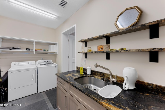 200 John Anderson Dr, Ormond Beach, FL 32176 - laundry room with washing machine and clothes dryer and cabinet space