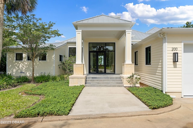 doorway to property featuring a porch