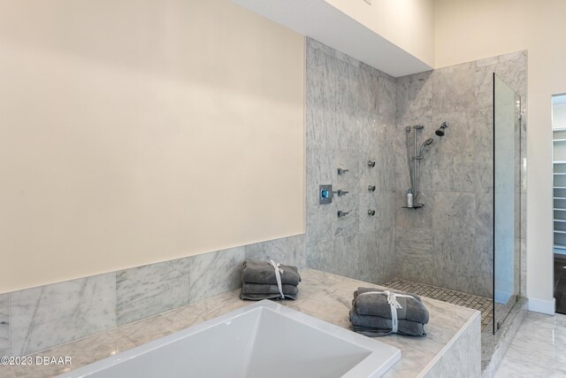 200 John Anderson Dr, Ormond Beach, FL 32176 - bathroom featuring a garden tub and a tile shower