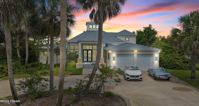 view of front of property with a garage