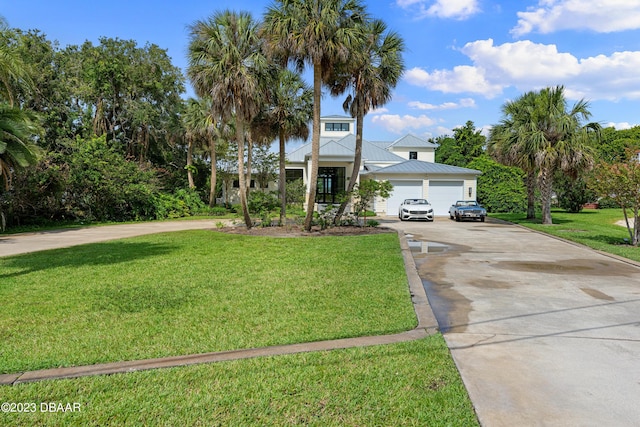 200 John Anderson Dr, Ormond Beach, FL 32176 - view of front of home featuring a front lawn and driveway