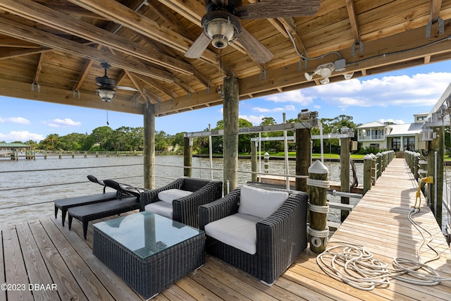 dock area with a water view