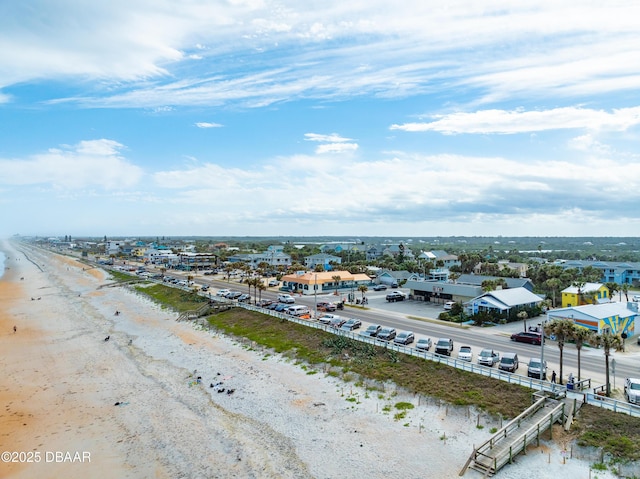 bird's eye view with a view of the beach