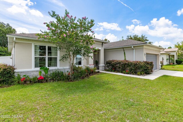 19 Russman Ln, Palm Coast, FL 32164 - view of front of property featuring an attached garage, a front lawn, stucco siding, and a shingled roof