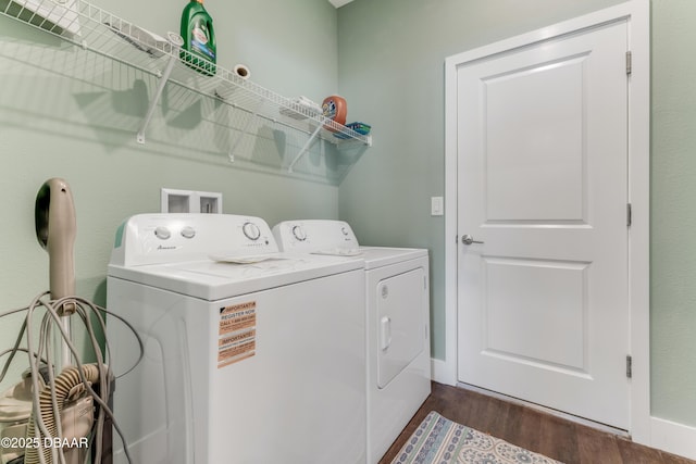 washroom featuring laundry area, dark wood-style floors, and independent washer and dryer