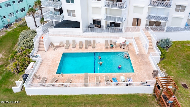 view of pool featuring a patio area