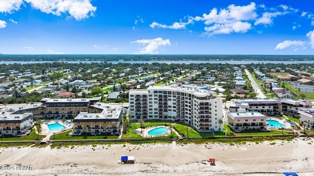 915 Ocean Shore Blvd Unit 801, Ormond Beach, FL 32176 - aerial view of a pool area and a nearby body of water