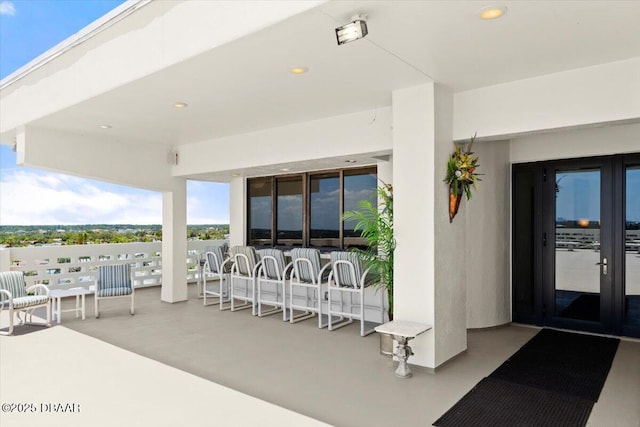 915 Ocean Shore Blvd Unit 801, Ormond Beach, FL 32176 - view of patio / terrace featuring french doors