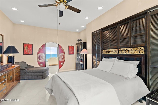 915 Ocean Shore Blvd Unit 801, Ormond Beach, FL 32176 - tiled bedroom featuring recessed lighting and a ceiling fan