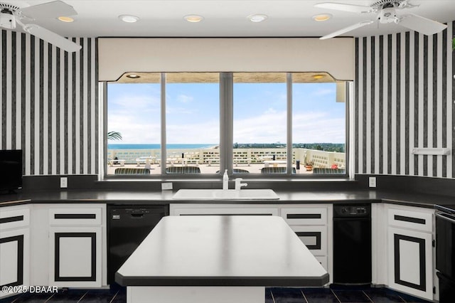 915 Ocean Shore Blvd Unit 801, Ormond Beach, FL 32176 - kitchen featuring ceiling fan, black dishwasher, a sink, wallpapered walls, and dark tile patterned flooring