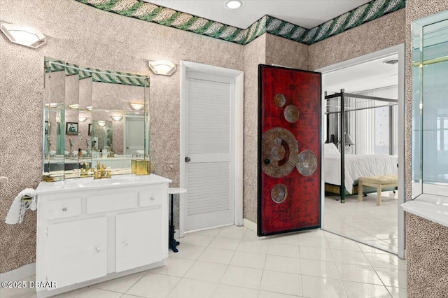 915 Ocean Shore Blvd Unit 801, Ormond Beach, FL 32176 - ensuite bathroom featuring vanity and tile patterned floors