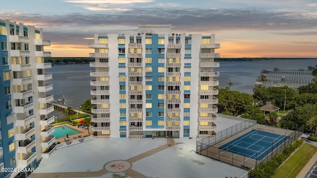 outdoor building at dusk with a water view