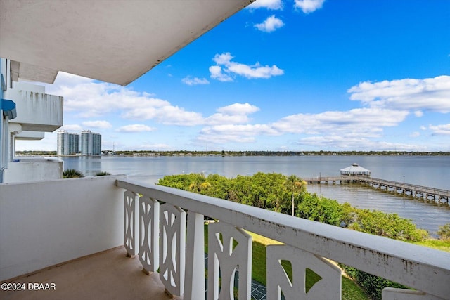 balcony featuring a water view