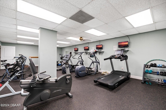 exercise room with a drop ceiling