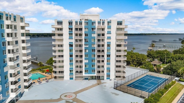 view of property with a water view