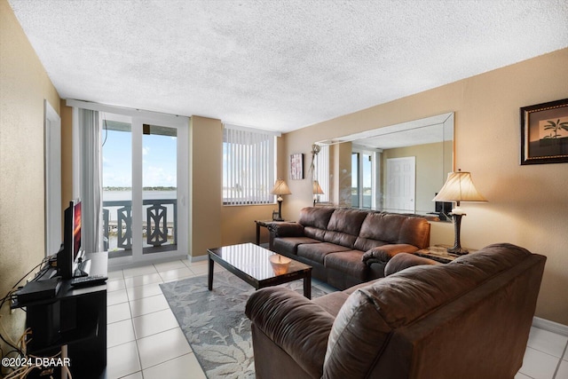 tiled living room with a textured ceiling