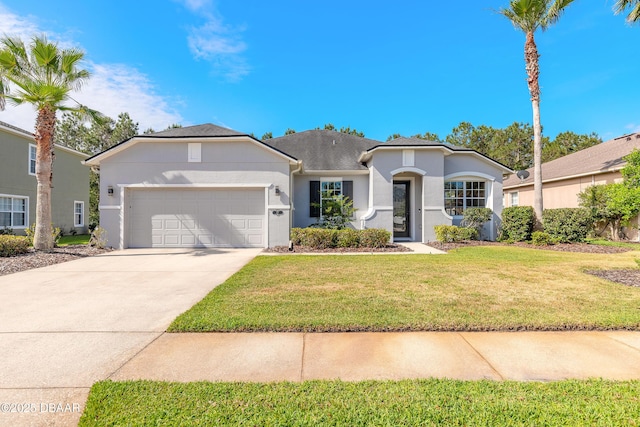 117 Boysenberry Ln, Daytona Beach, FL 32124 - ranch-style house featuring an attached garage, a front lawn, stucco siding, and concrete driveway