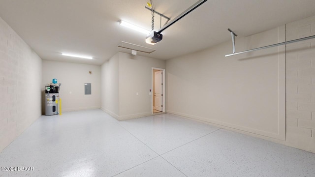 garage featuring electric panel, a garage door opener, and water heater