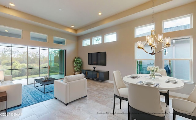 tiled living room featuring a high ceiling and a notable chandelier