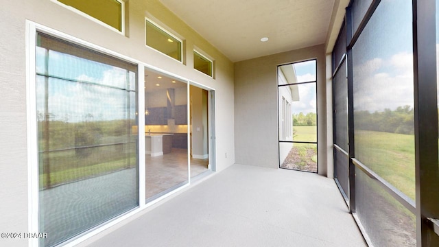 sunroom featuring plenty of natural light