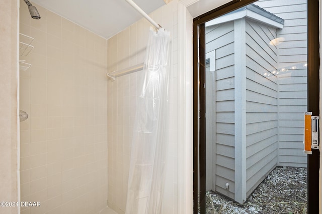 bathroom with a shower with shower curtain