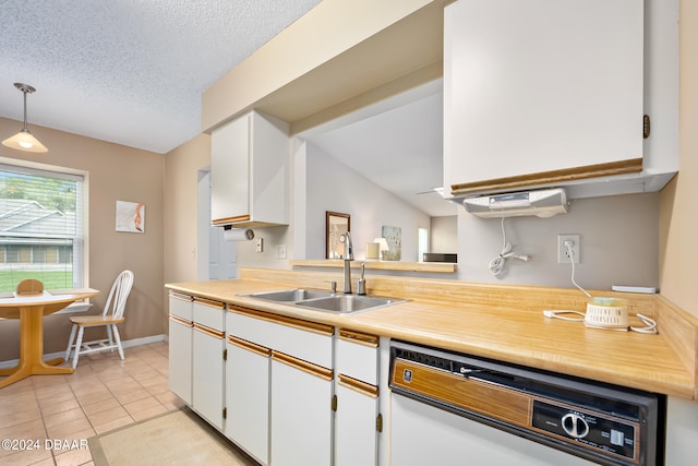 kitchen with dishwasher, white cabinetry, pendant lighting, and sink