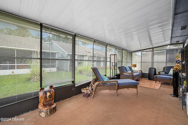 sunroom / solarium with vaulted ceiling