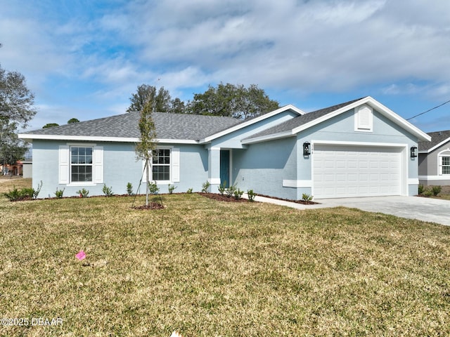 single story home featuring a garage and a front lawn