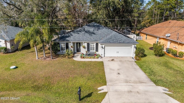 single story home with a front yard and a garage