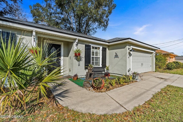 ranch-style home featuring a garage