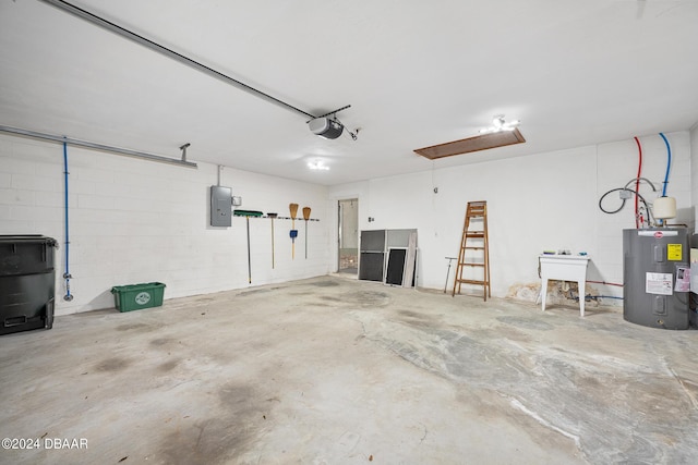 212 Glenbriar Cir, Daytona Beach, FL 32114 - garage with water heater, a garage door opener, electric panel, concrete block wall, and a sink