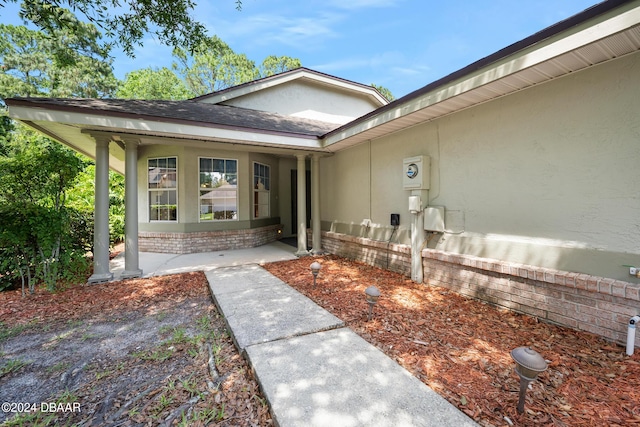 212 Glenbriar Cir, Daytona Beach, FL 32114 - property entrance featuring a shingled roof