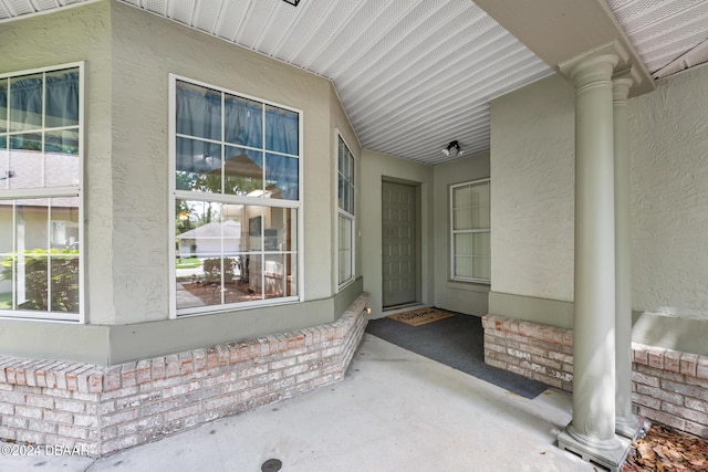 212 Glenbriar Cir, Daytona Beach, FL 32114 - view of exterior entry with stucco siding