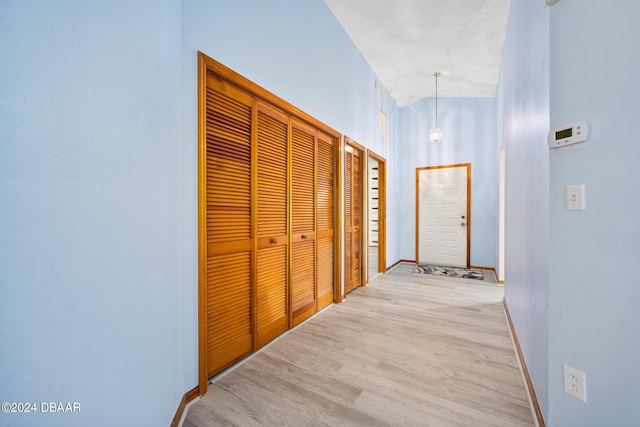 212 Glenbriar Cir, Daytona Beach, FL 32114 - hallway with baseboards and light wood-style floors