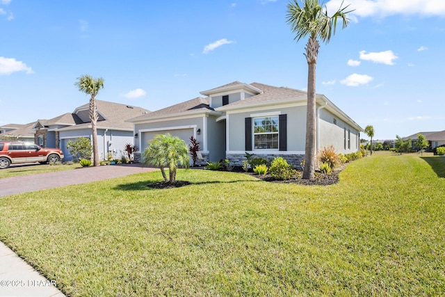 view of front facade featuring an attached garage, stone siding, stucco siding, a front yard, and driveway