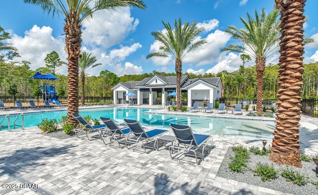 view of swimming pool featuring a patio