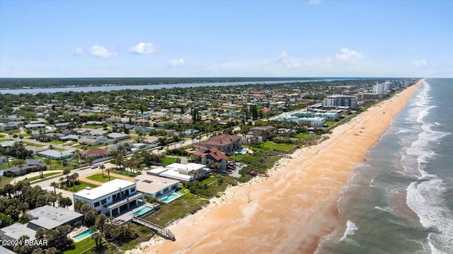 aerial view with a beach view and a water view