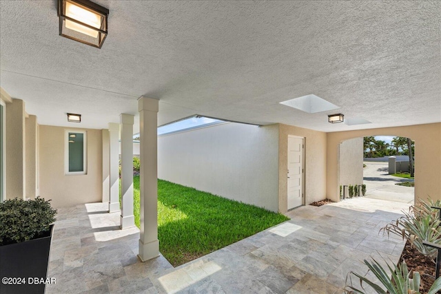 entrance to property with a patio area